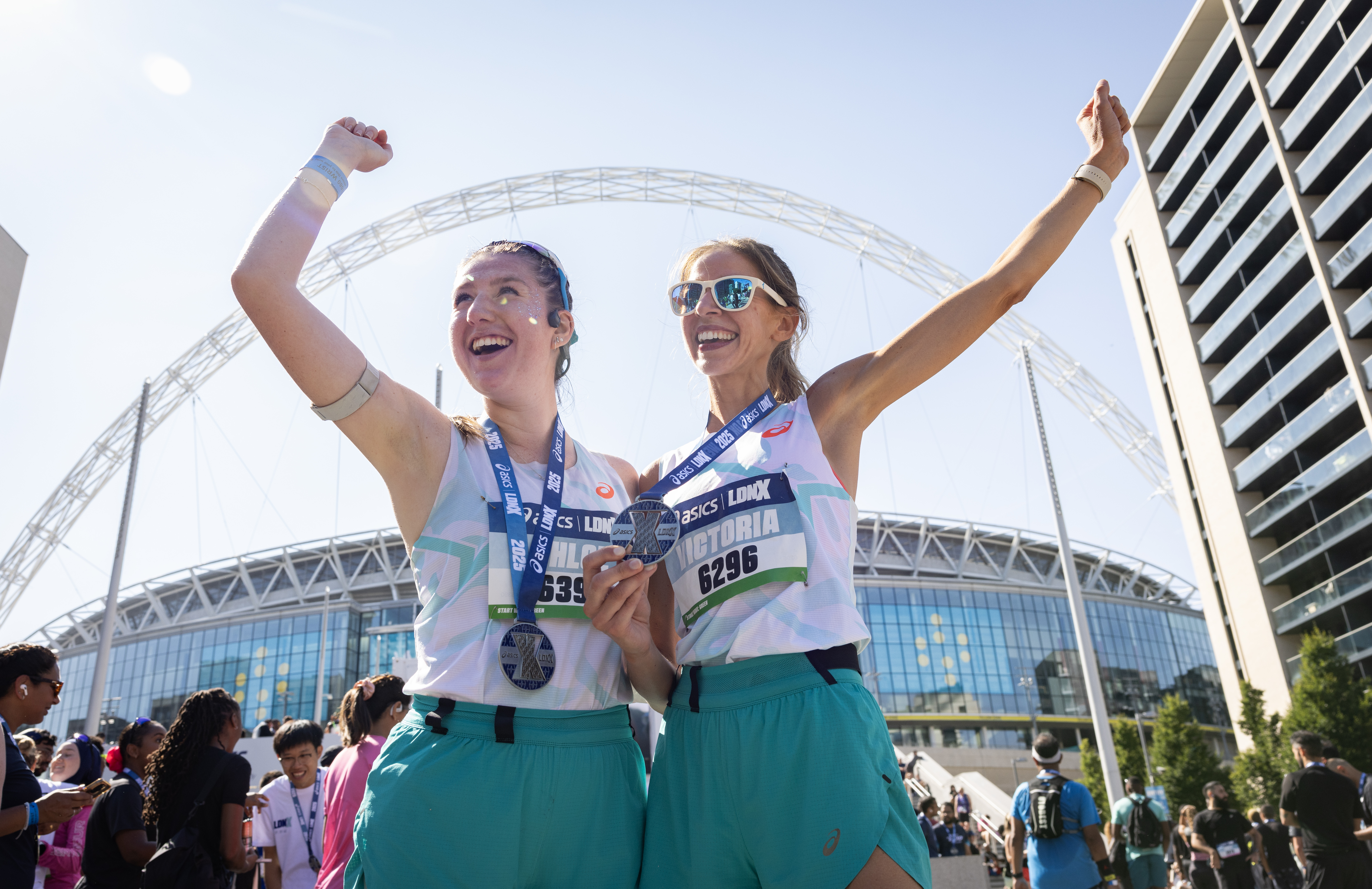 Runners celebrating at ASICS LDNX